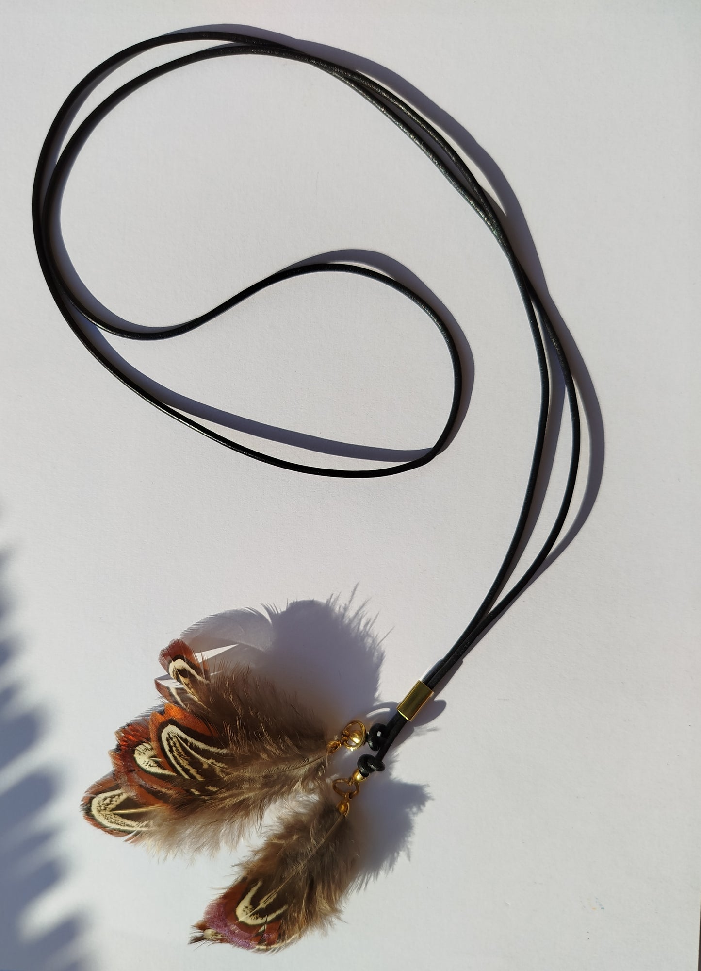 Collarino con piume