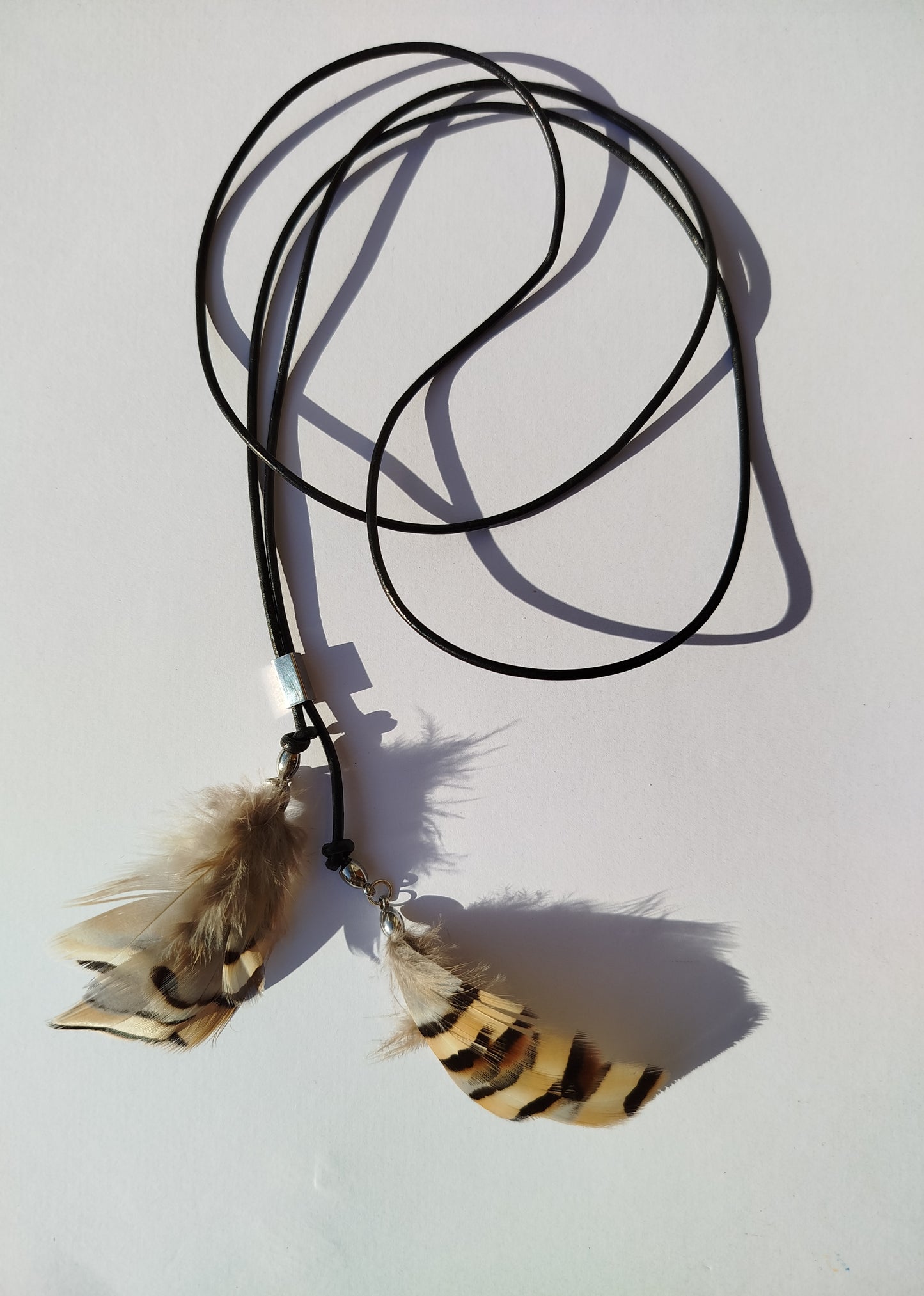Collarino con piume