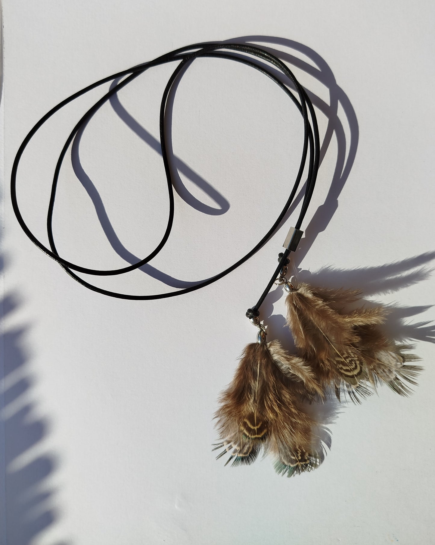 Collarino con piume