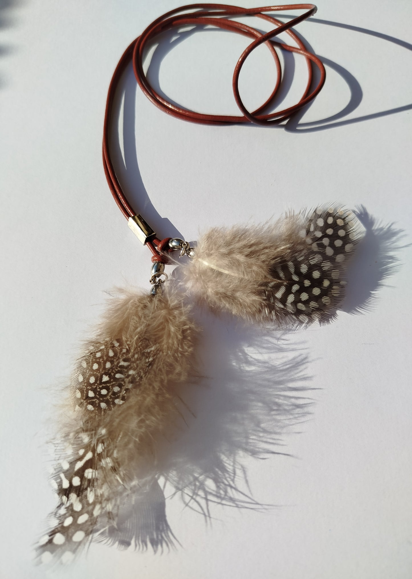 Collarino con piume boho