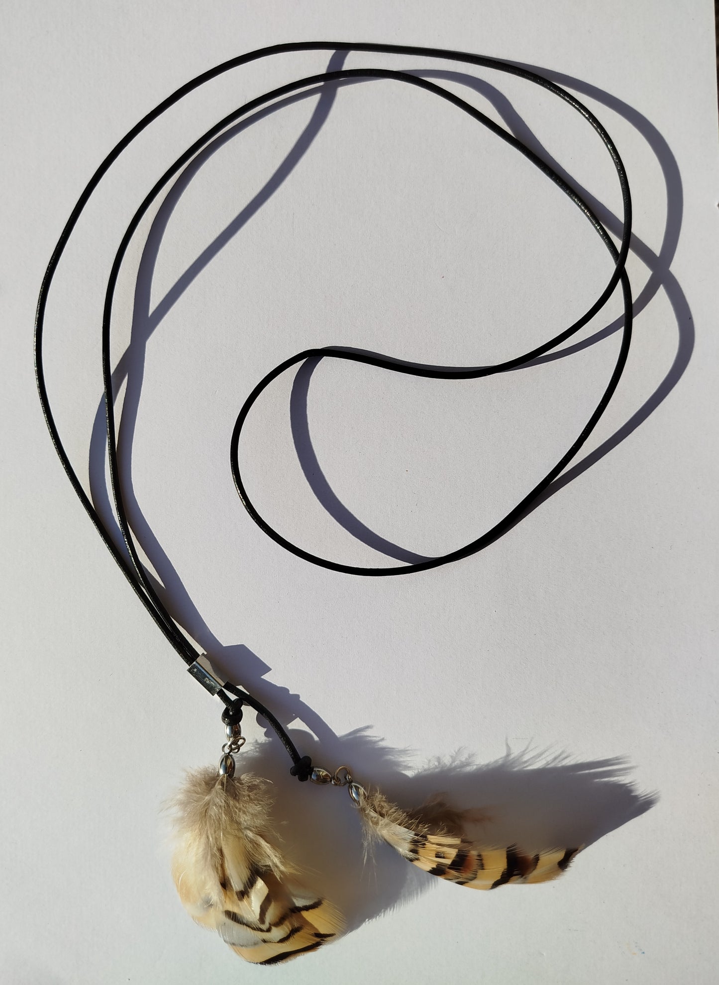 Collarino con piume