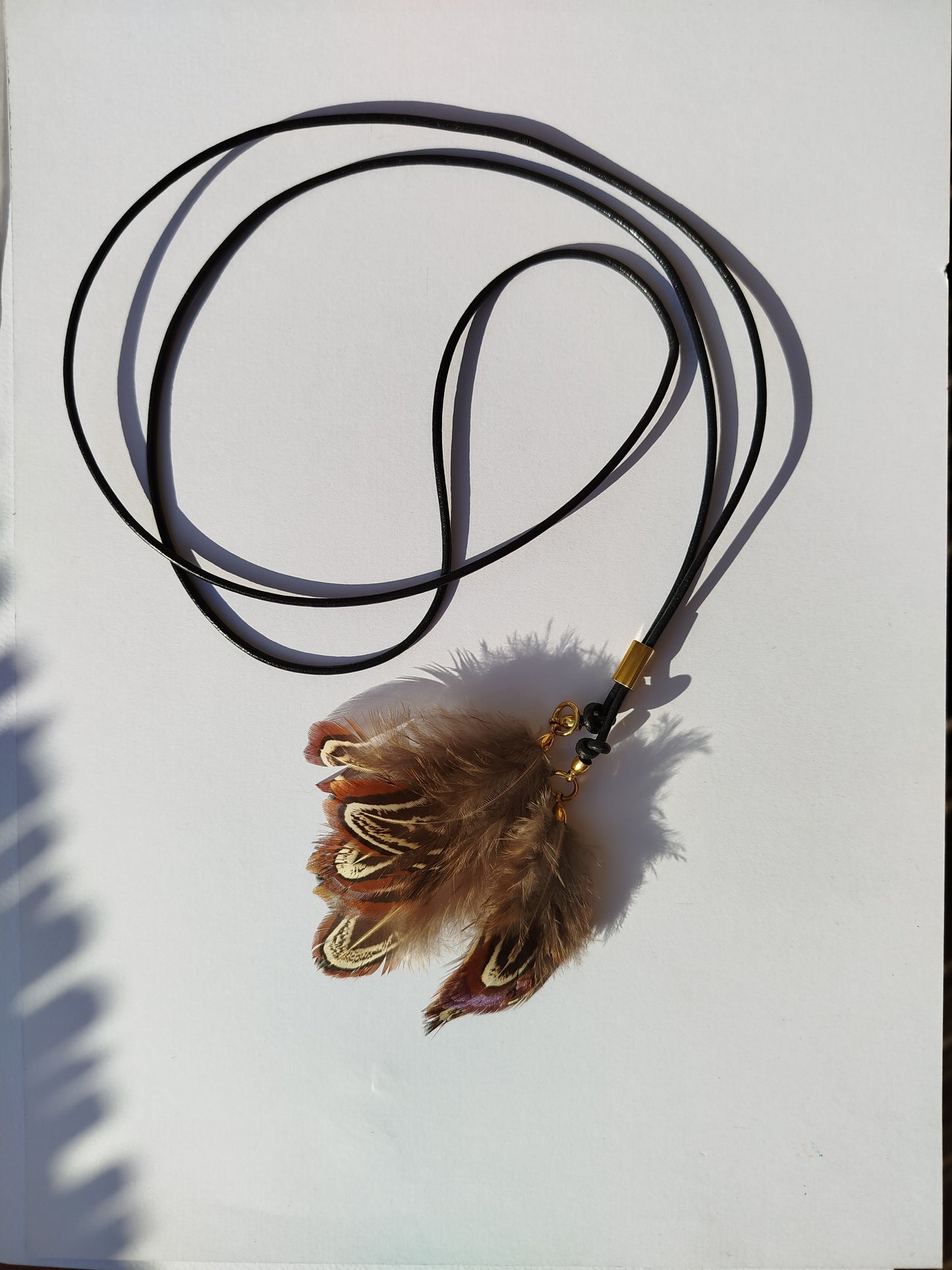 Collarino con piume