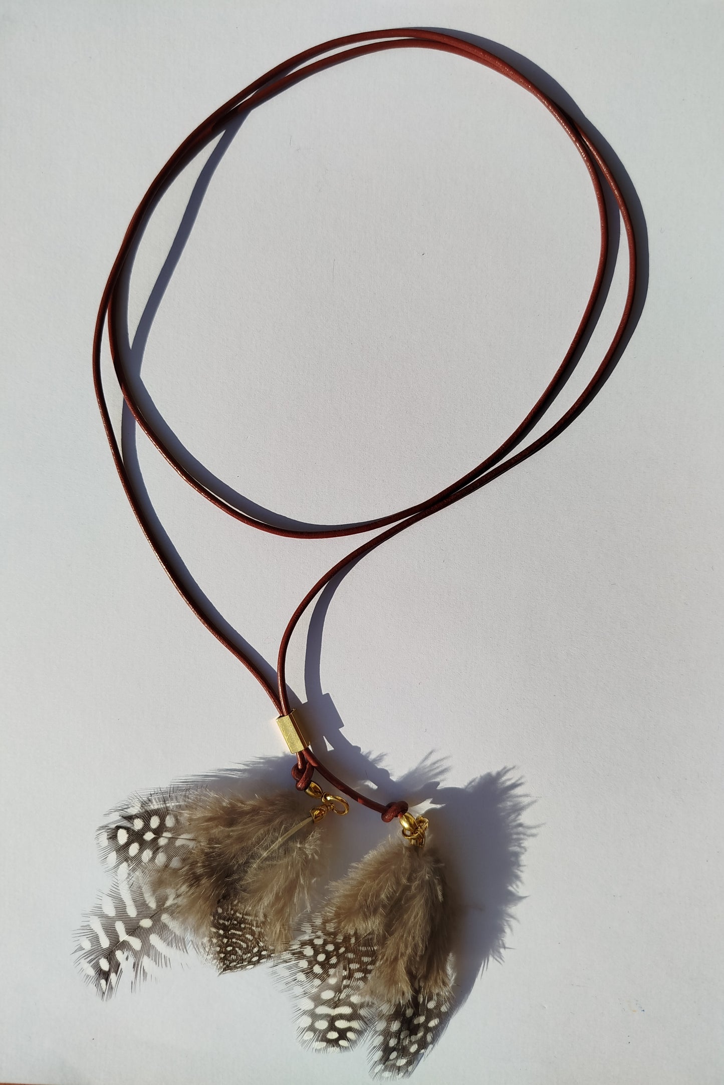 Collarino con piume boho