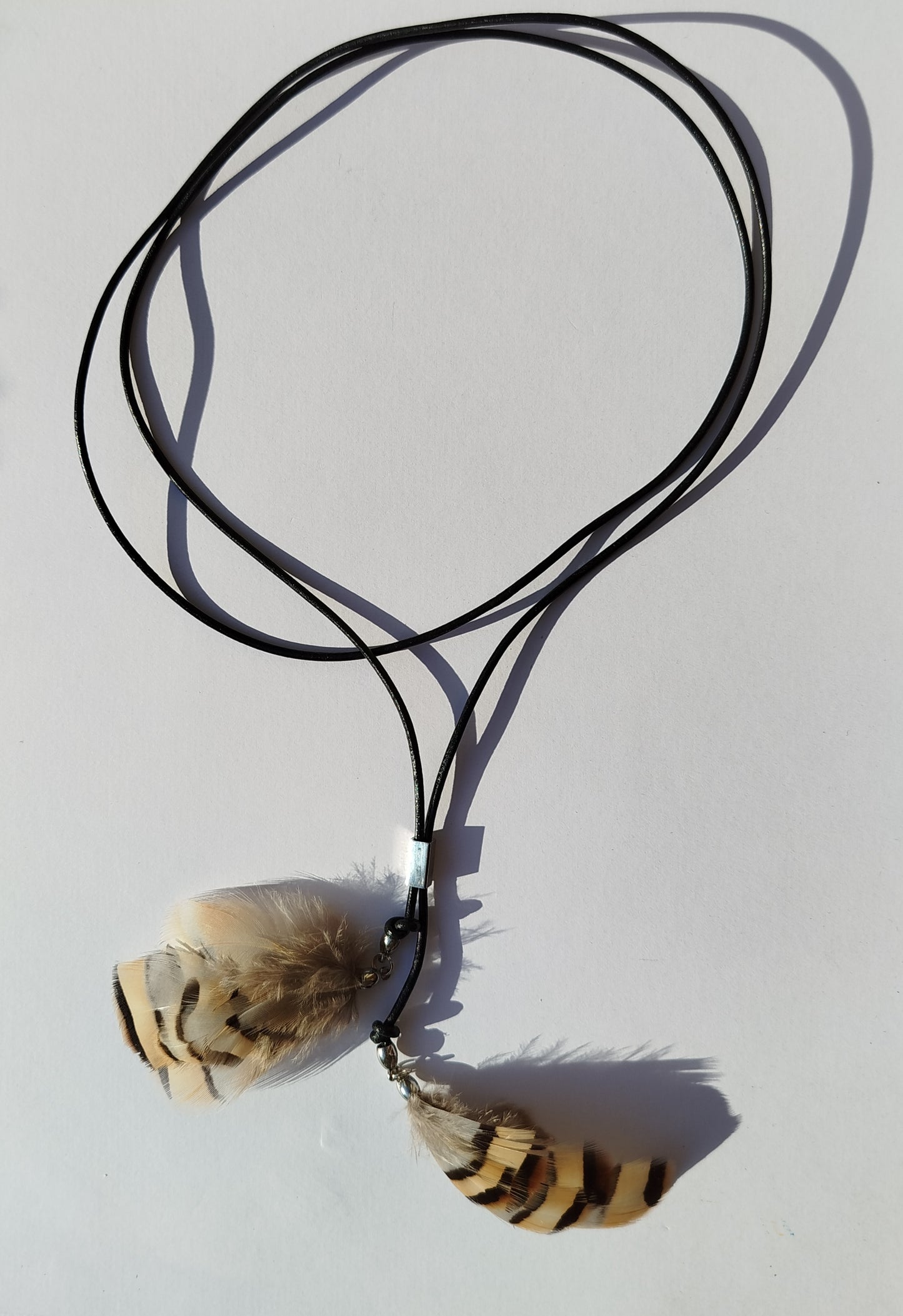 Collarino con piume