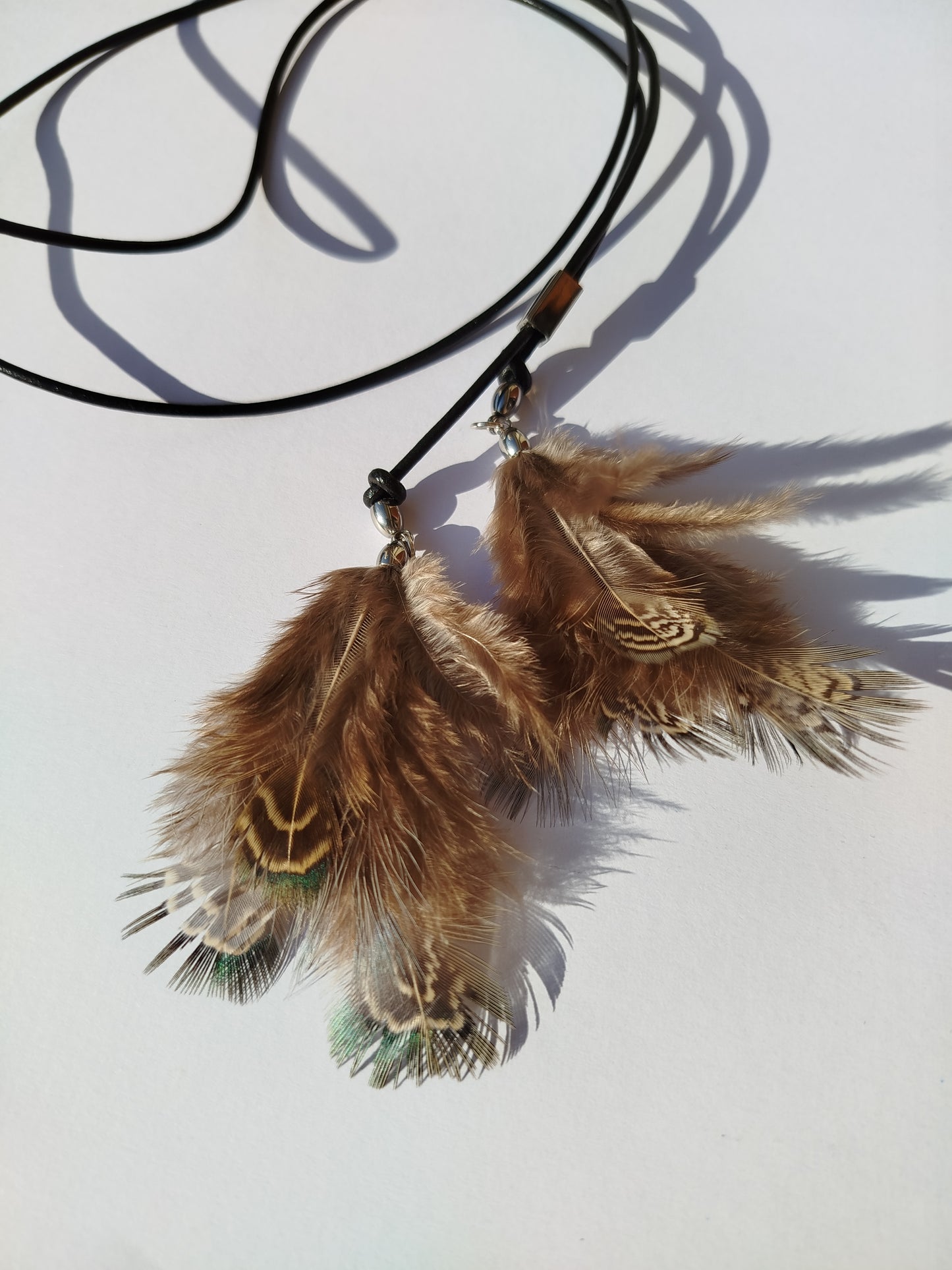 Collarino con piume