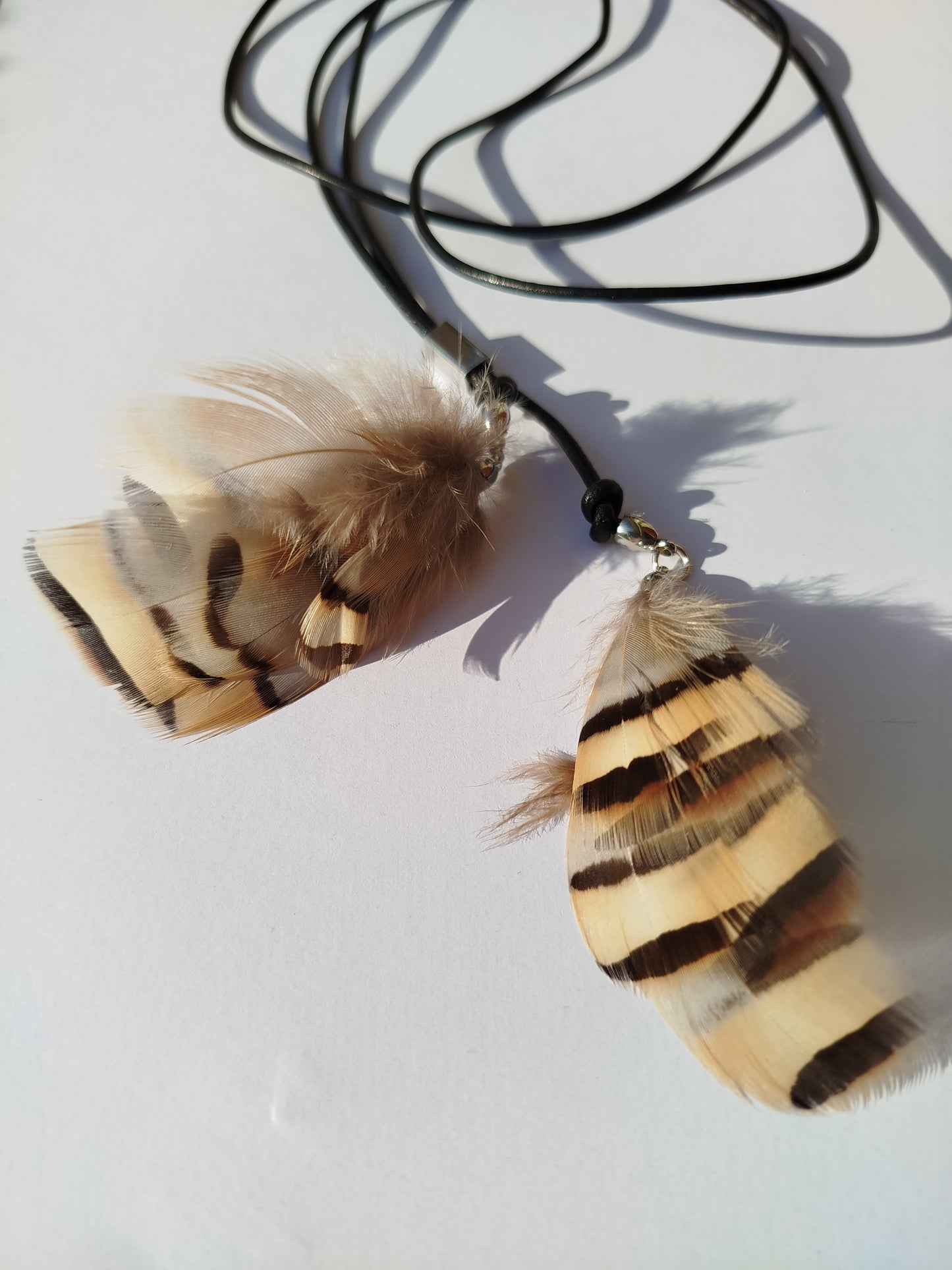 Collarino con piume