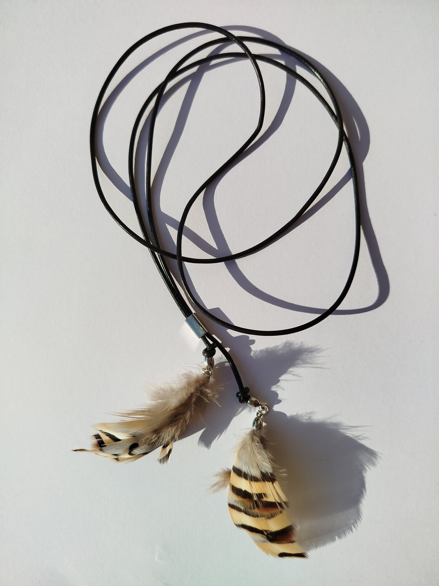 Collarino con piume