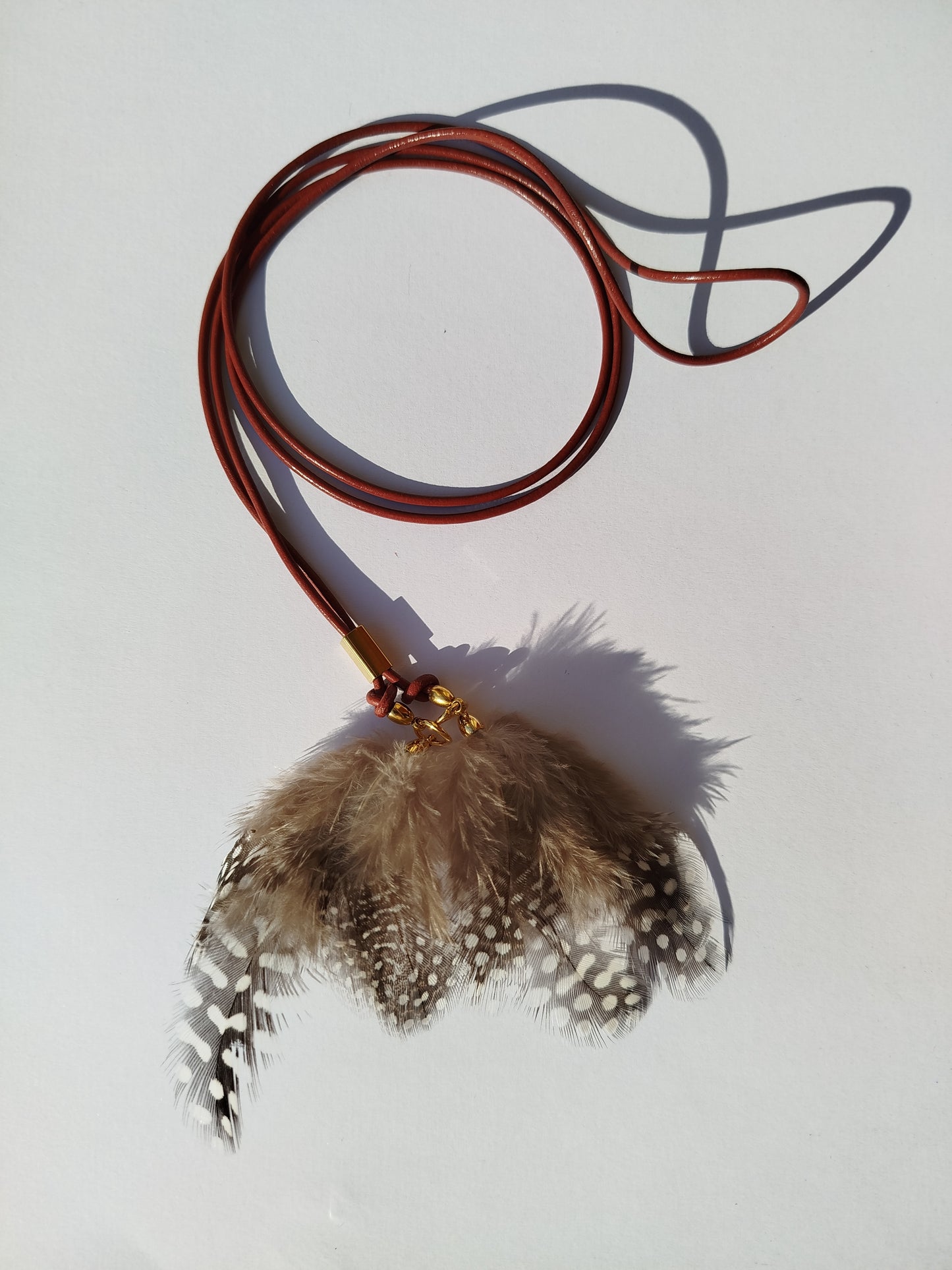 Collarino con piume boho