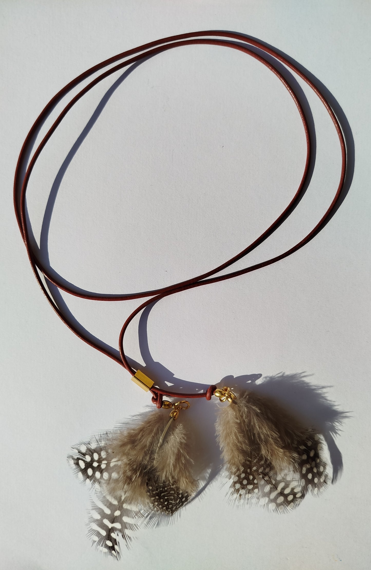 Collarino con piume boho