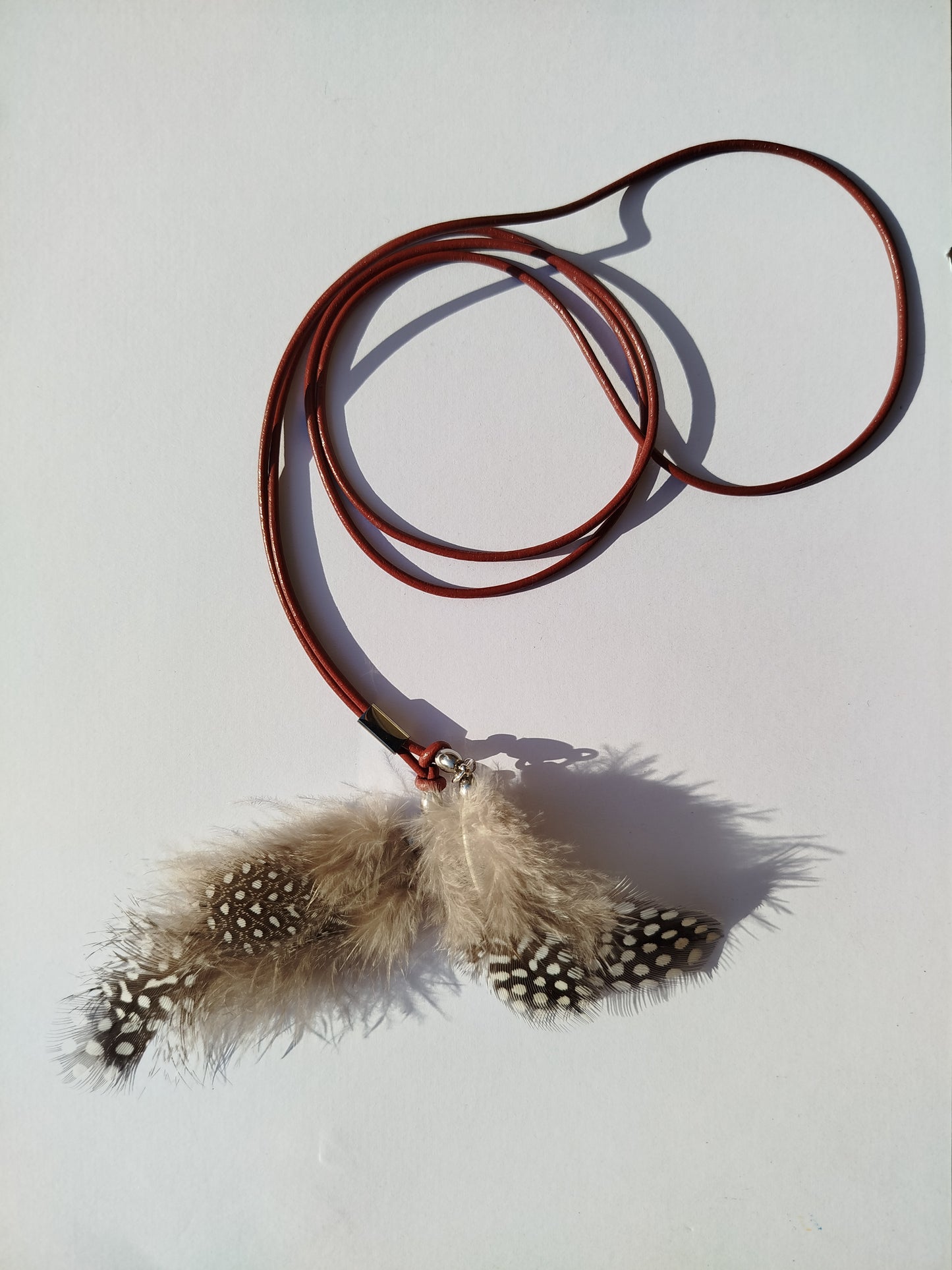 Collarino con piume boho