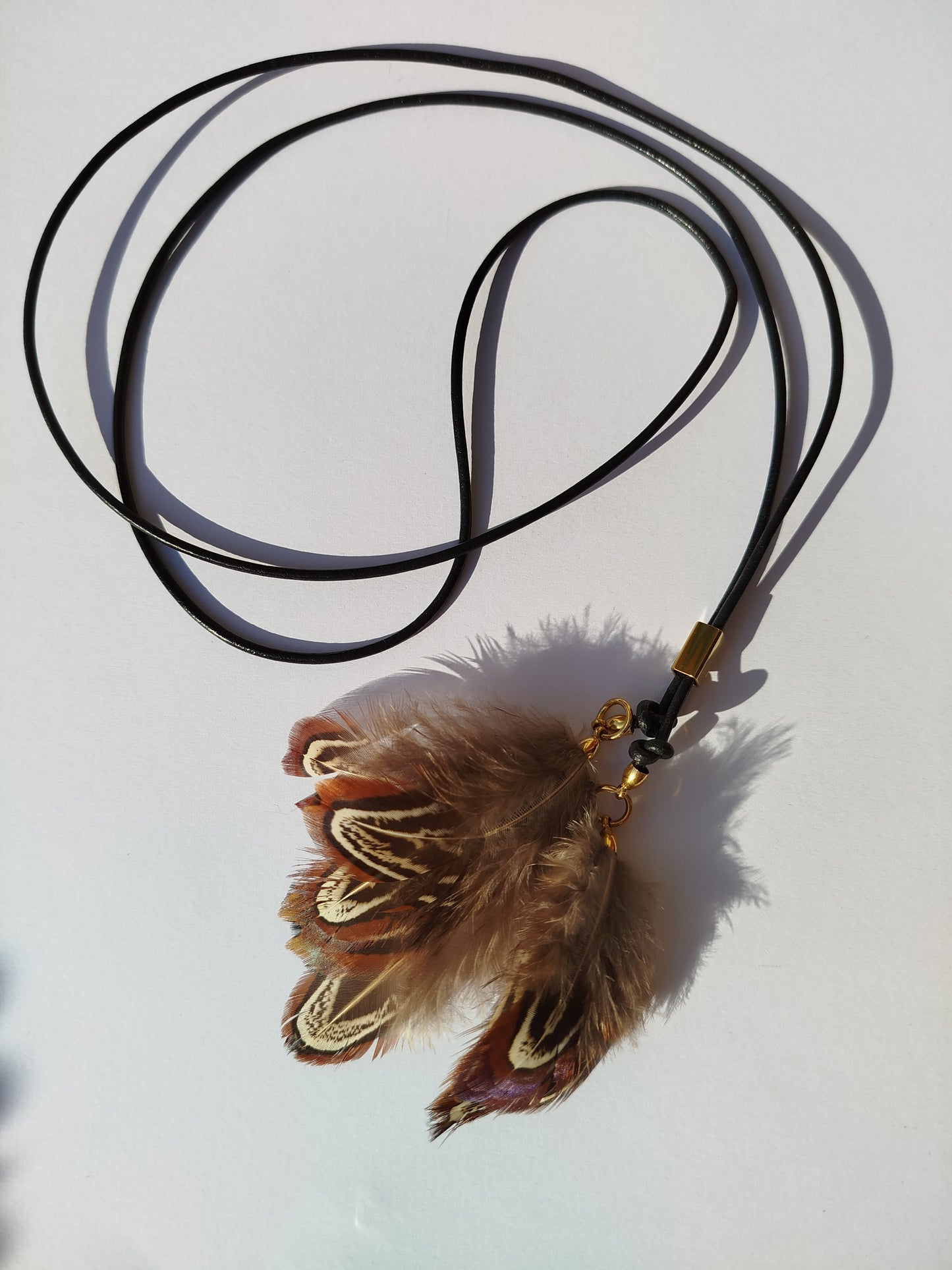 Collarino con piume